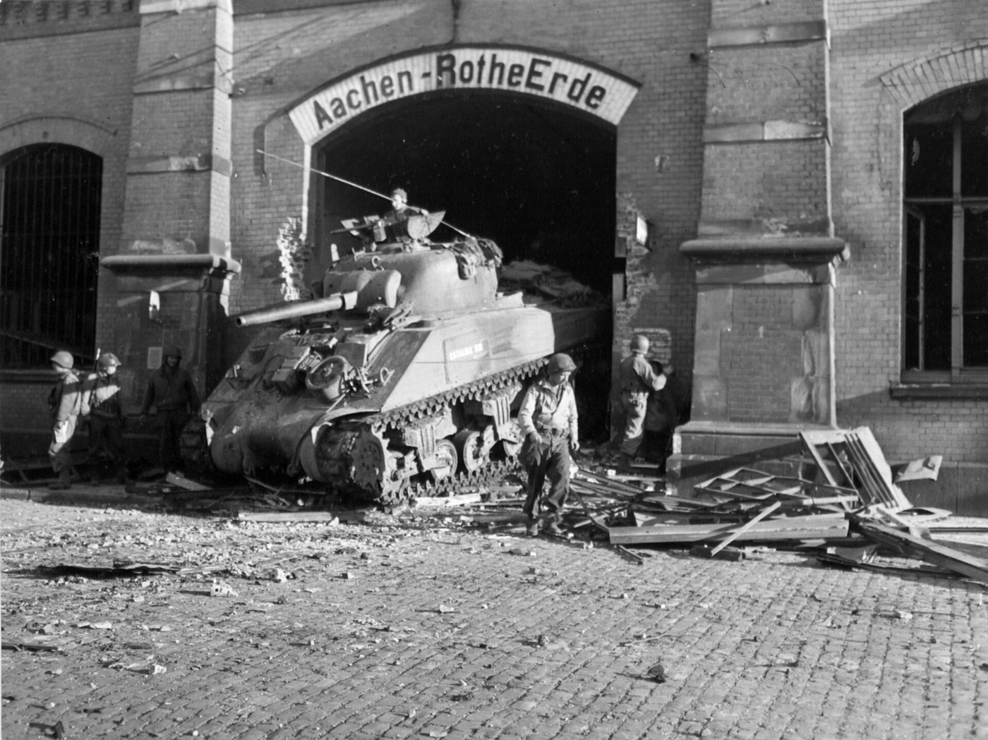 M4 Sherman tank drives through the Aachen Rothe Erde train station, Germ