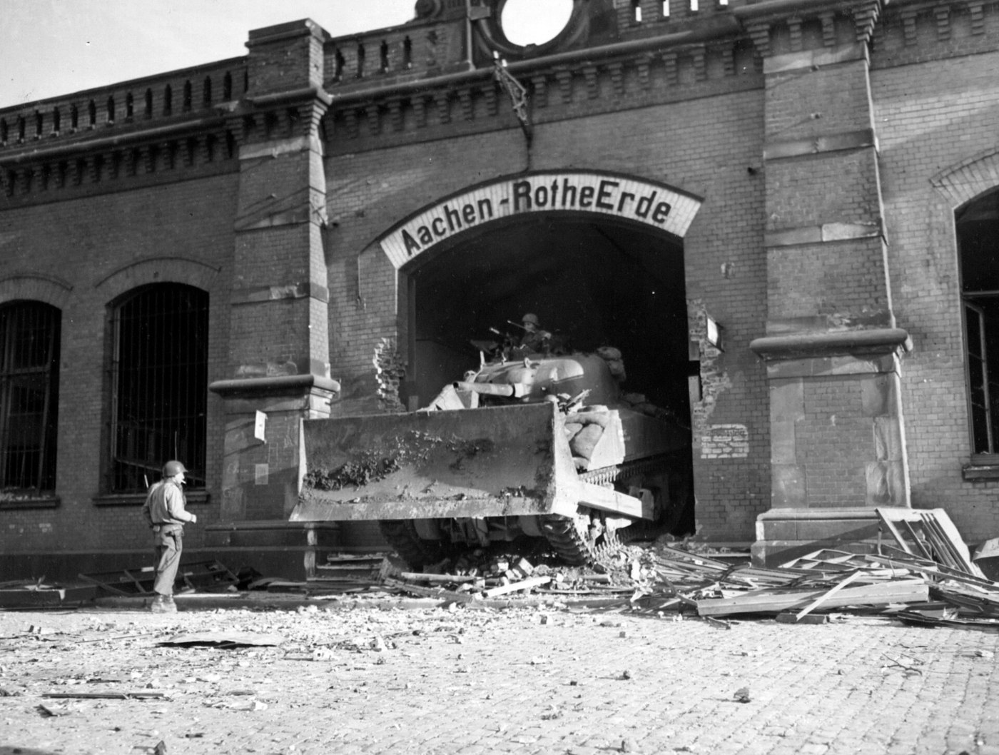 M4 Dozer tank drives through the Aachen Rothe Erde rail station, in Octo