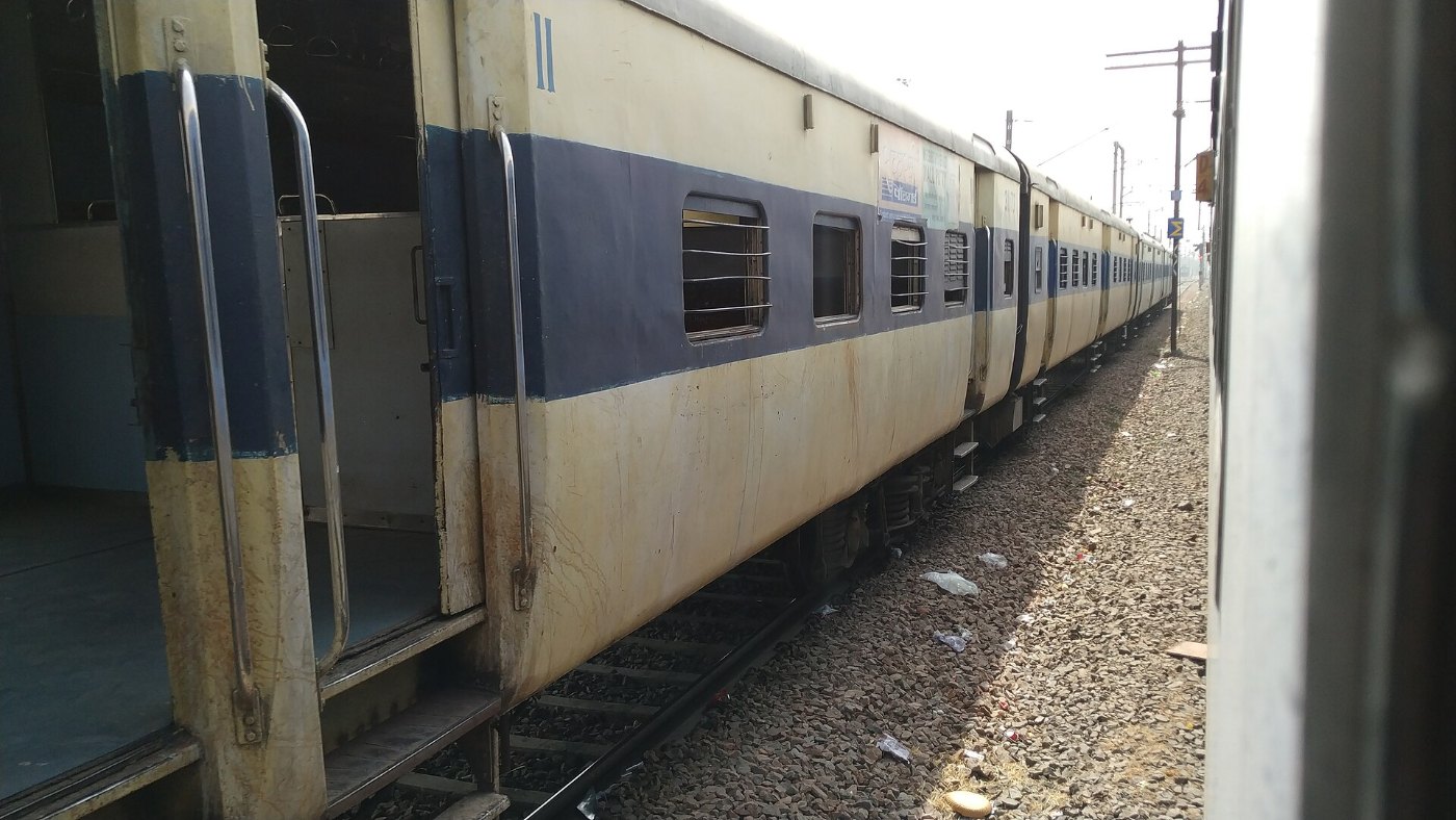 Local train standing outside Ghaziabad Junction railway station