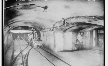 Tracks and train cars in Chicago freight tunnel LCCN