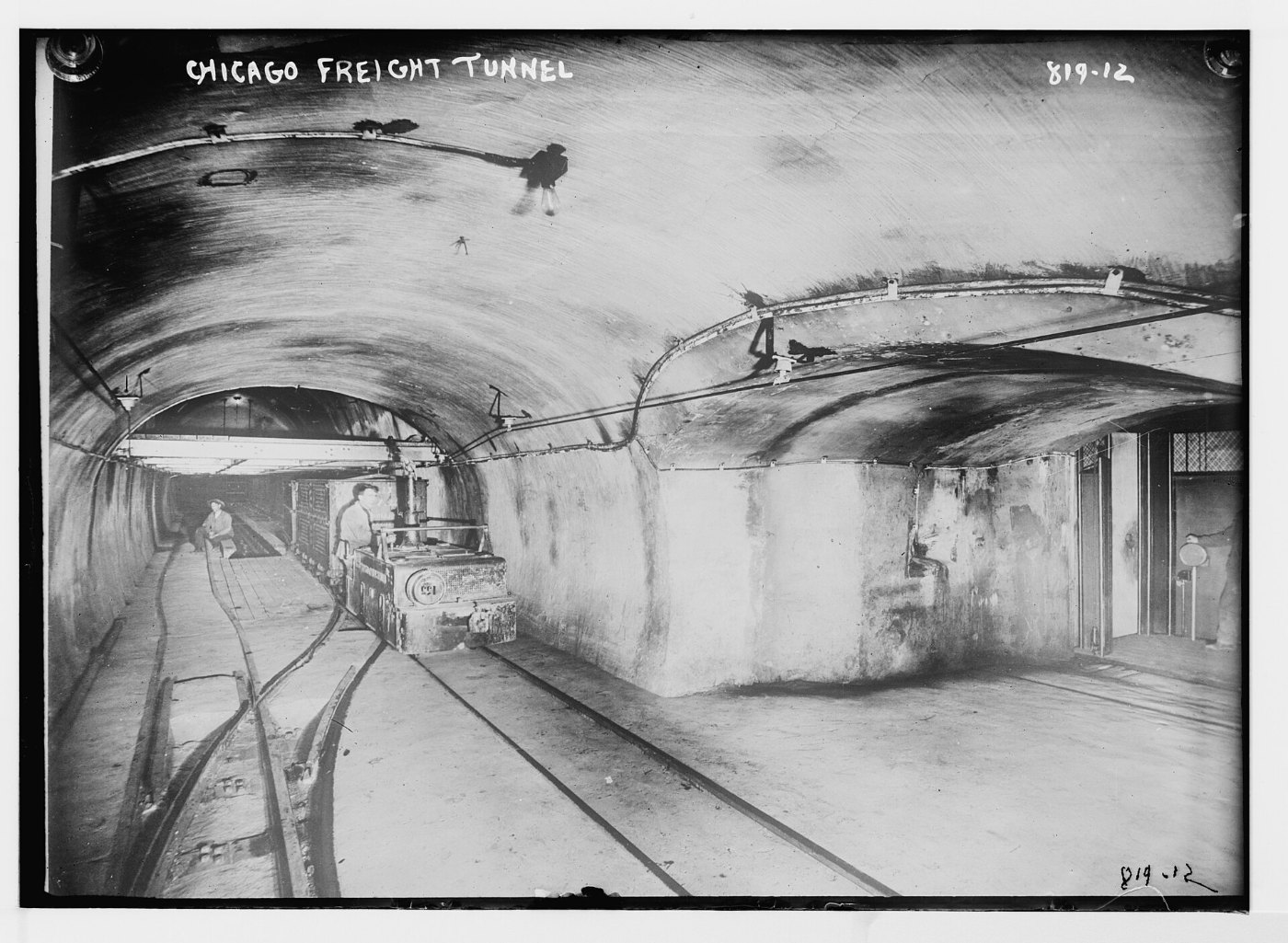 Tracks and train cars in Chicago freight tunnel LCCN