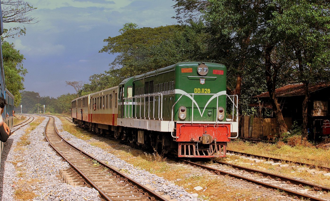 MYANMAR RAILWAYS LOCO HAULED LOCAL TRAIN ON THE YANGON CIRCULAR RAILWAY