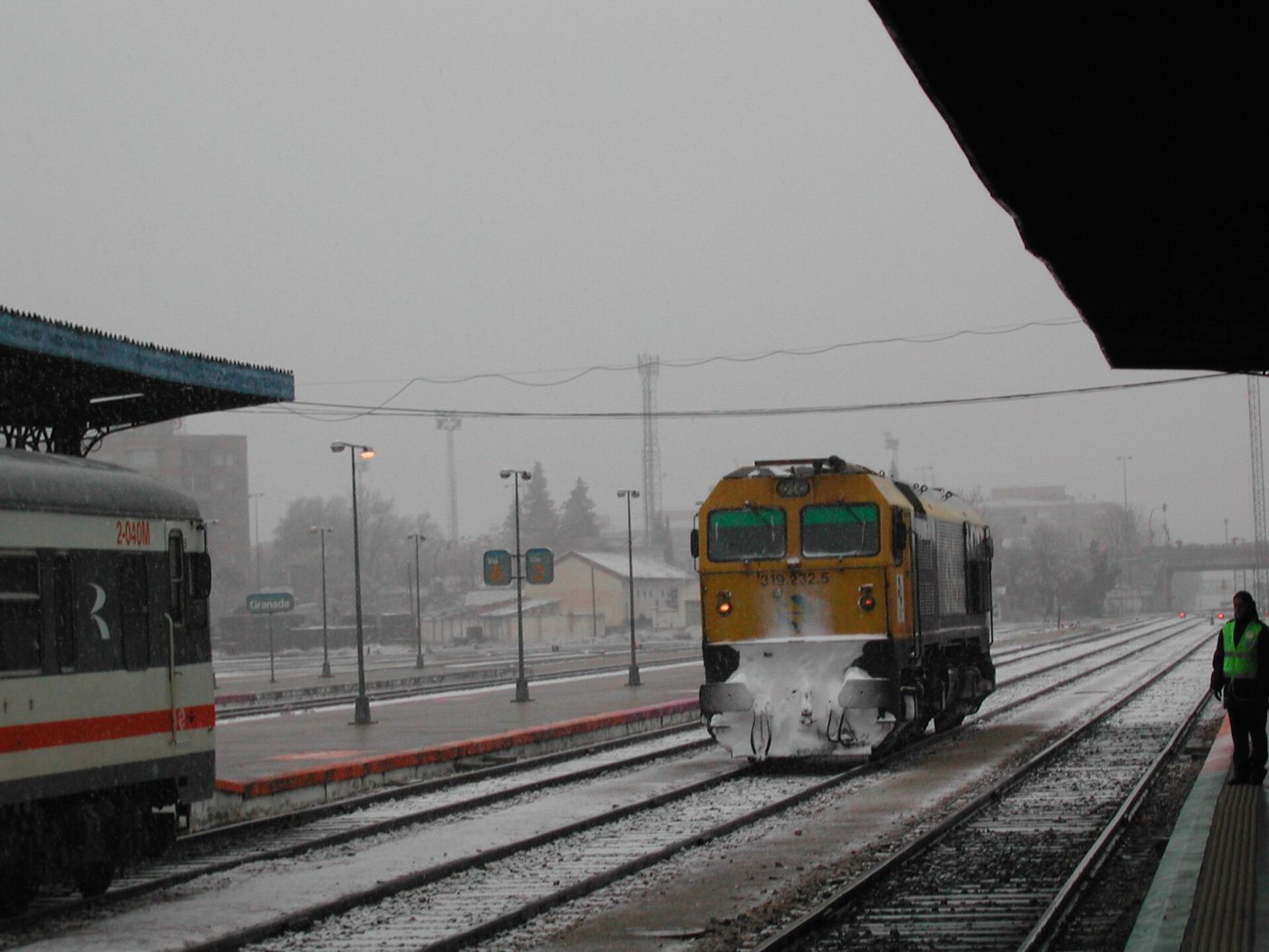 Granada railway station with loco and snow