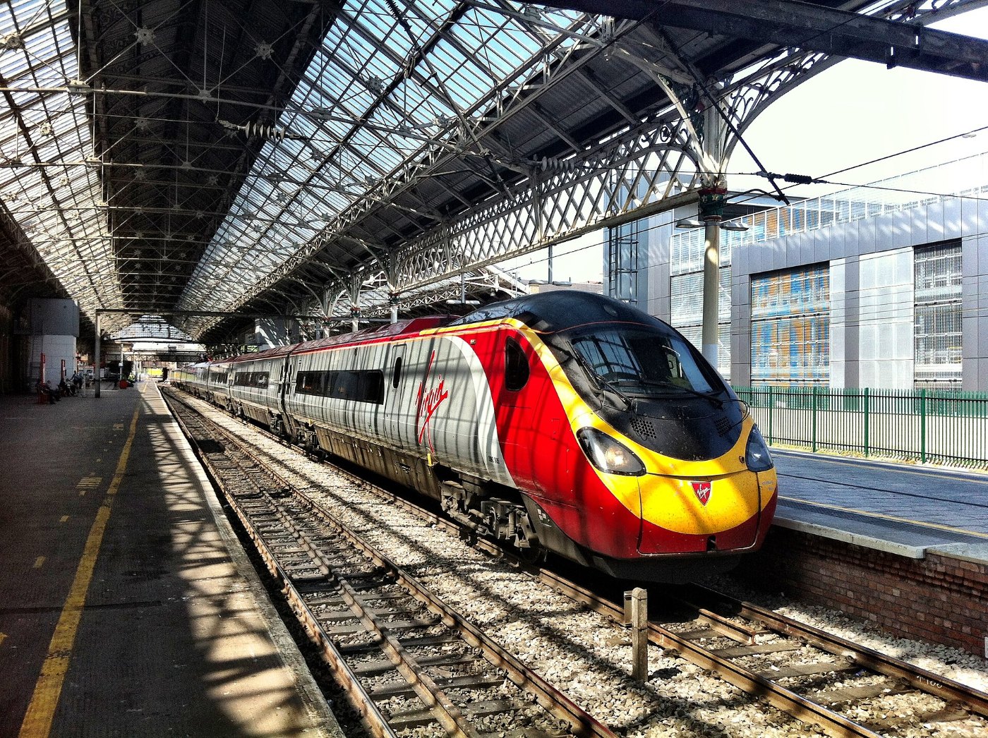 A Virgin 'Pendolino' train at Platform 5 of Preston Railway Station geog