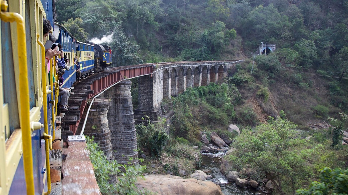 Nilgiri Queen Crosses a River ()